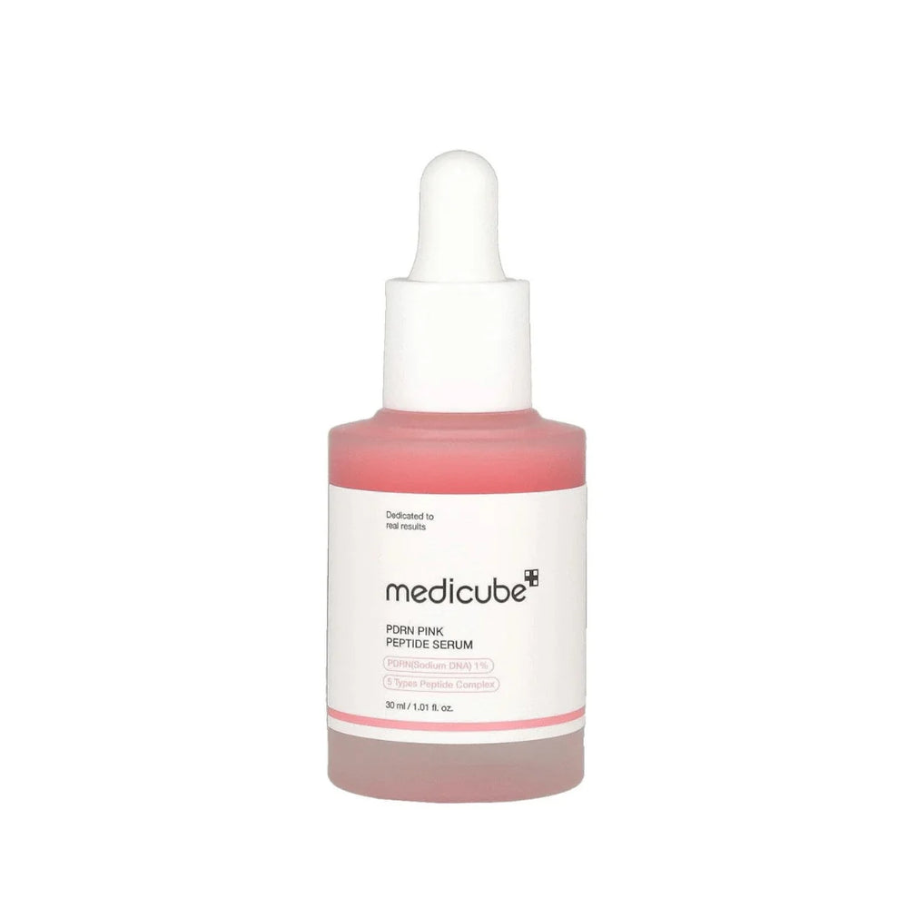 Medicube Formulin Peptide Serum in a frosted glass dropper bottle with a white cap and a white label, containing a pinkish liquid.