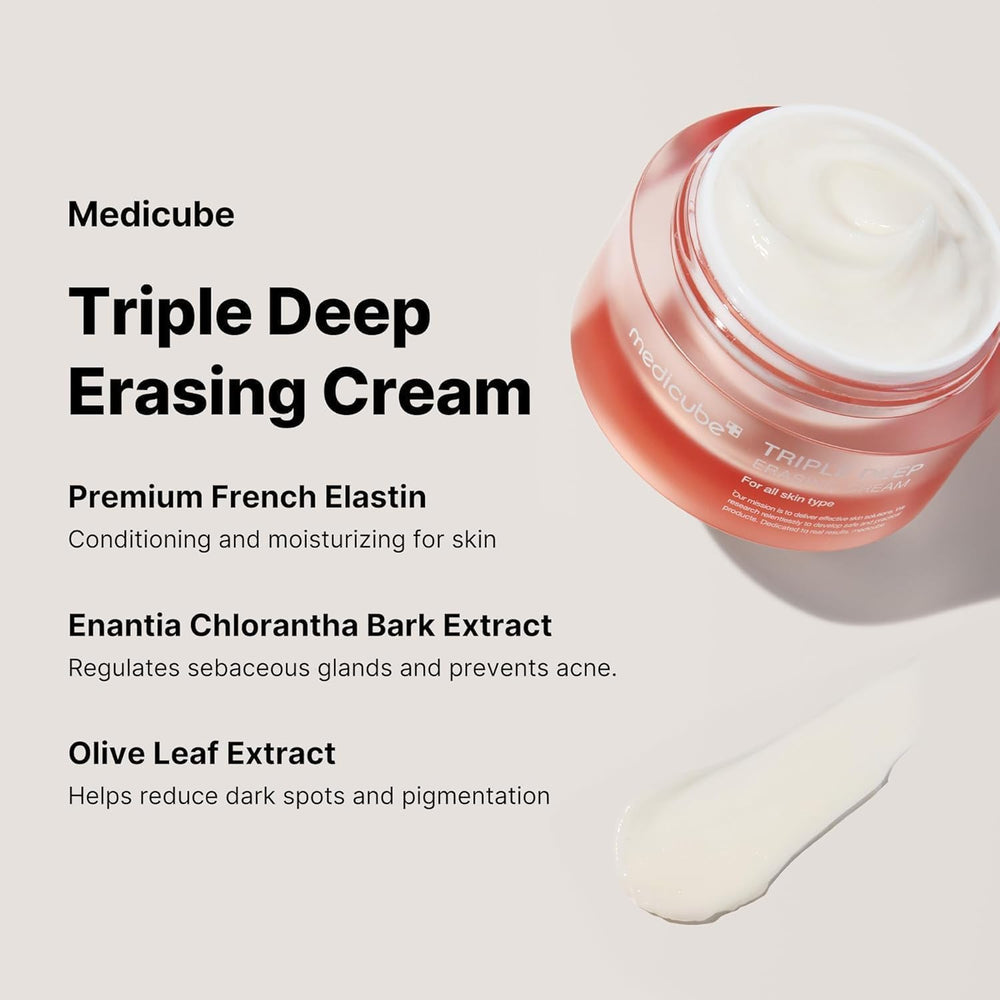 Medicube Triple Deep Erasing Cream jar with cream on a applicator on a light background