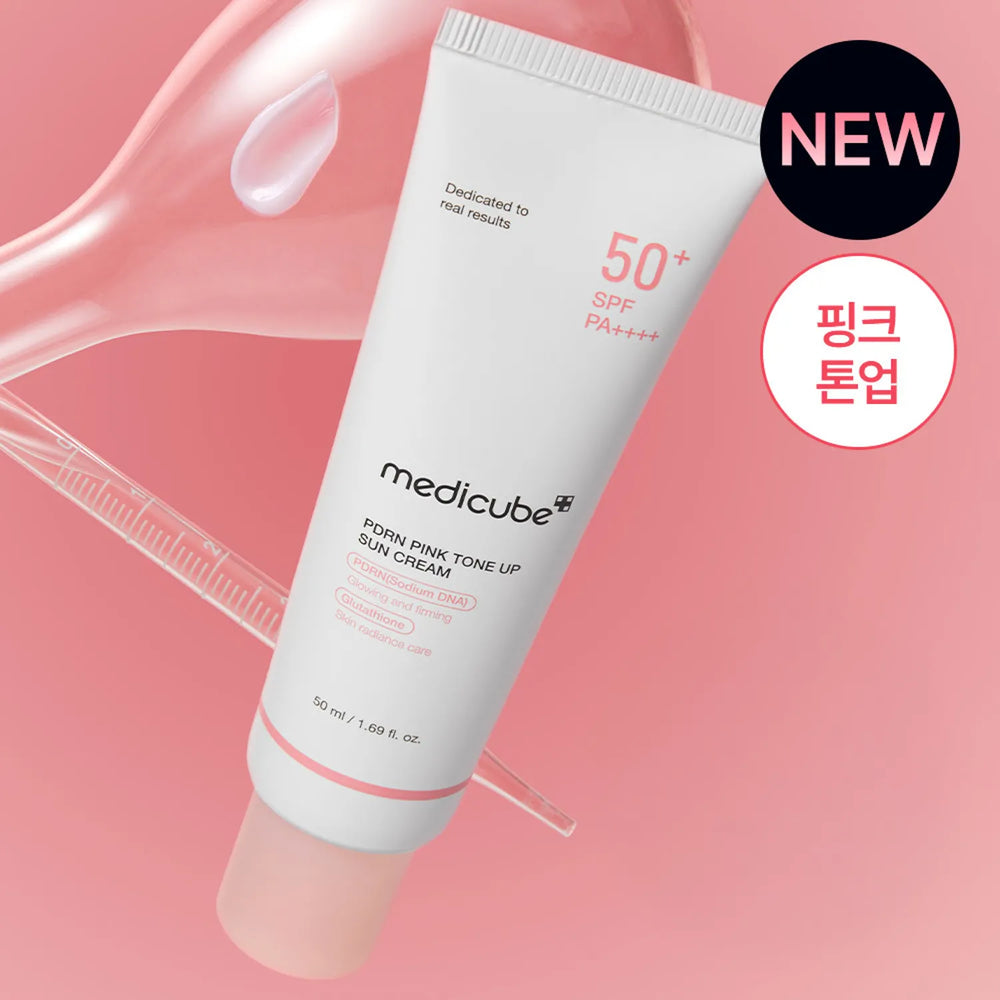 Medicube pink sun cream tube on a pink background with 'NEW' and Korean text.