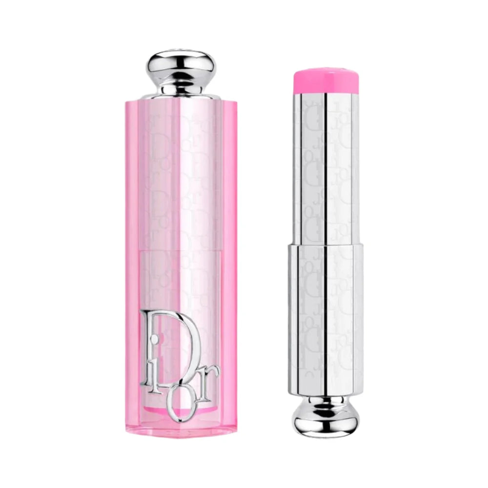 Dior Lip Tint in the shade Pink, showing both the closed translucent pink tube with the Dior logo and the open silver tube with the pink tinted lip balm bullet, on a white background.